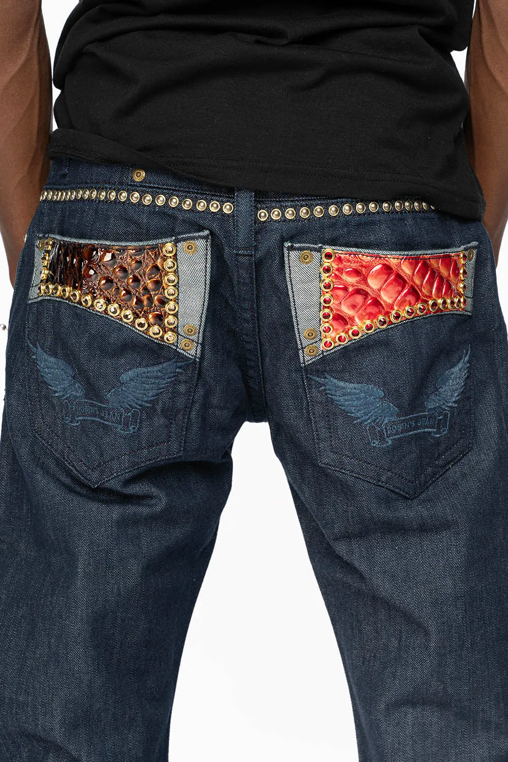 BOOT CUT JEAN WITH PATENT LEATHER POCKET  EMBELLISHED WITH CRYSTALS AND STUDS IN RINSE WASH