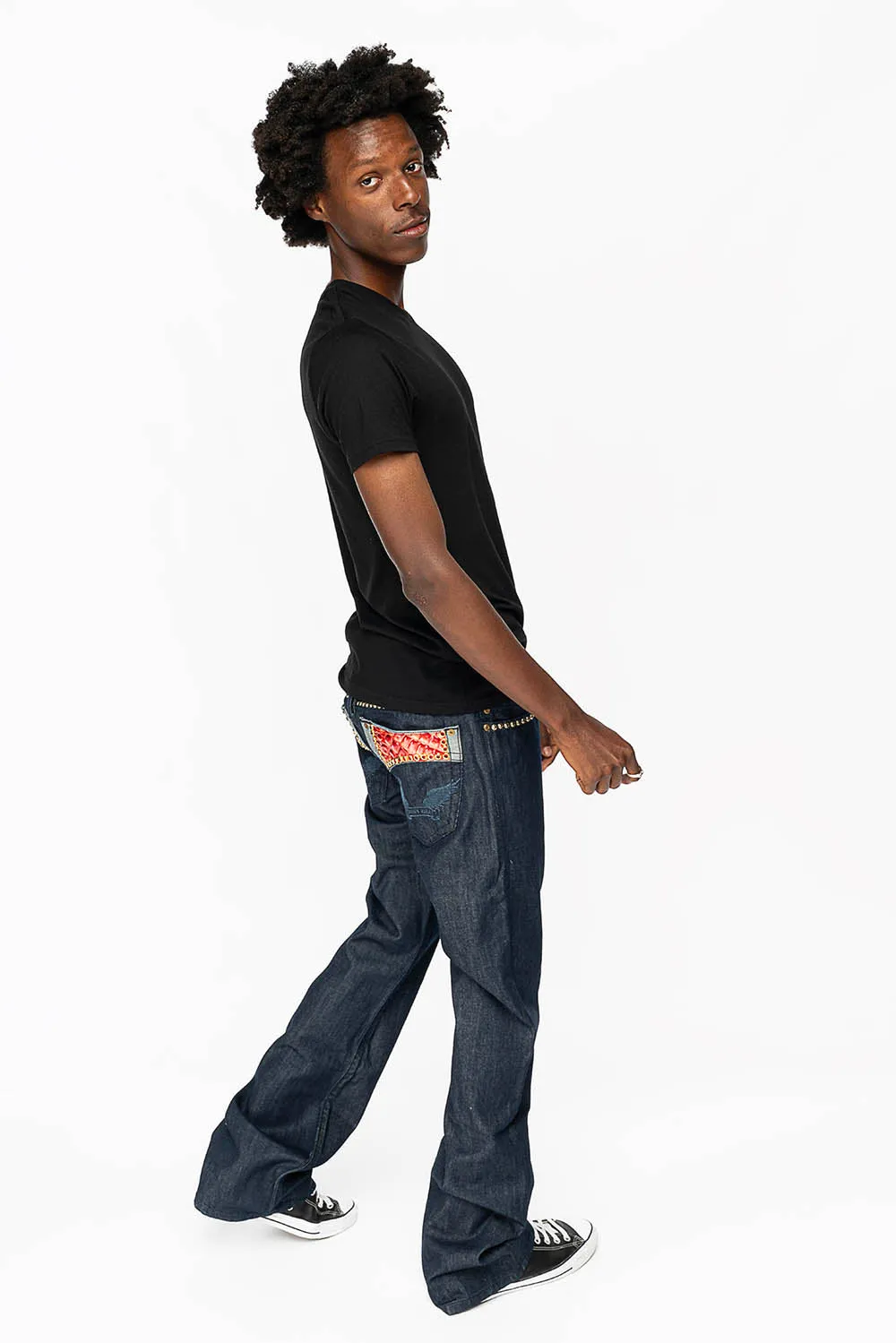 BOOT CUT JEAN WITH PATENT LEATHER POCKET  EMBELLISHED WITH CRYSTALS AND STUDS IN RINSE WASH