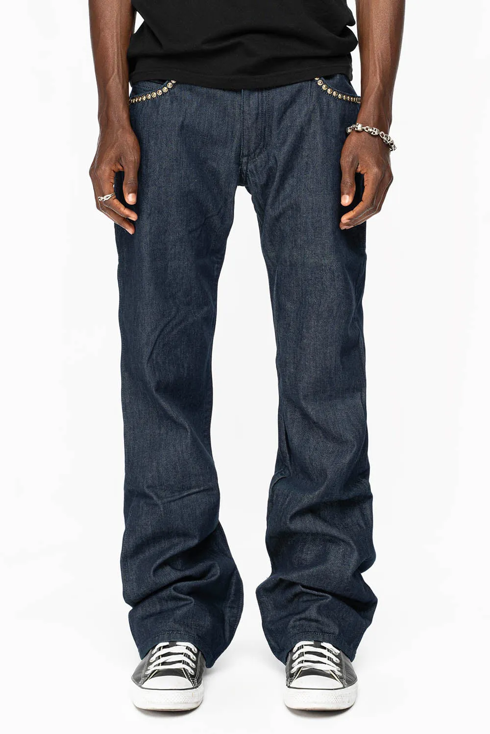BOOT CUT JEAN WITH PATENT LEATHER POCKET  EMBELLISHED WITH CRYSTALS AND STUDS IN RINSE WASH
