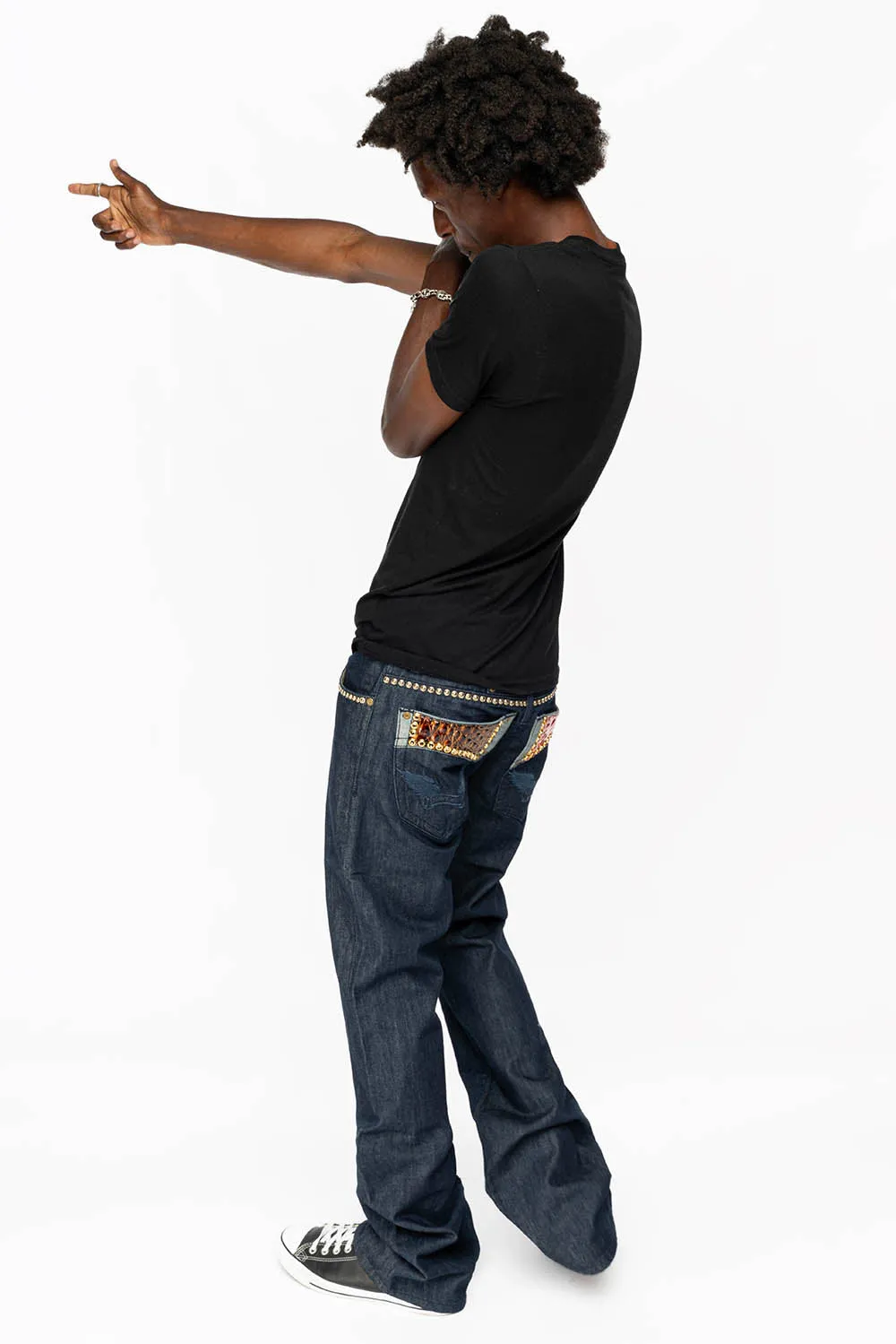 BOOT CUT JEAN WITH PATENT LEATHER POCKET  EMBELLISHED WITH CRYSTALS AND STUDS IN RINSE WASH