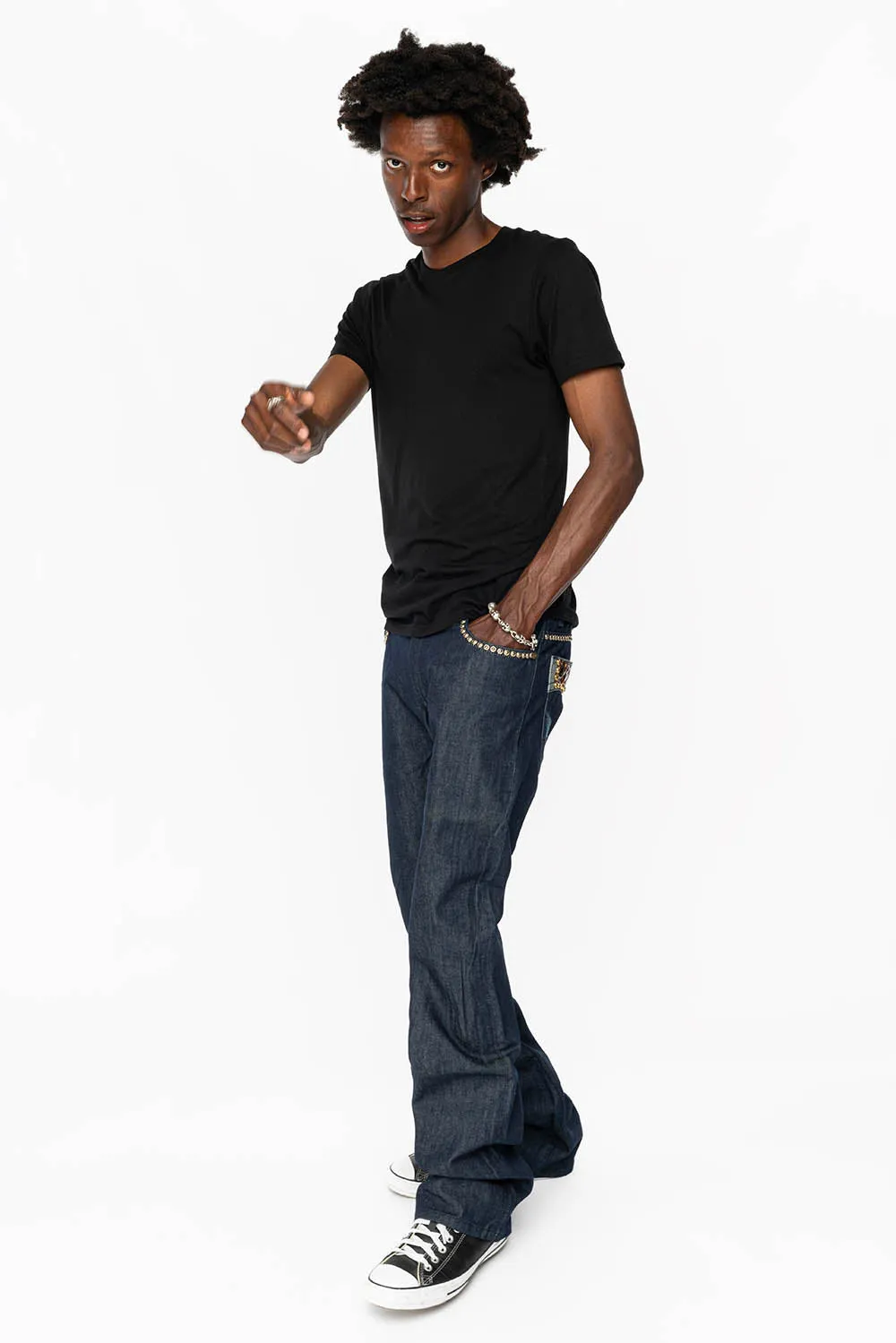 BOOT CUT JEAN WITH PATENT LEATHER POCKET  EMBELLISHED WITH CRYSTALS AND STUDS IN RINSE WASH