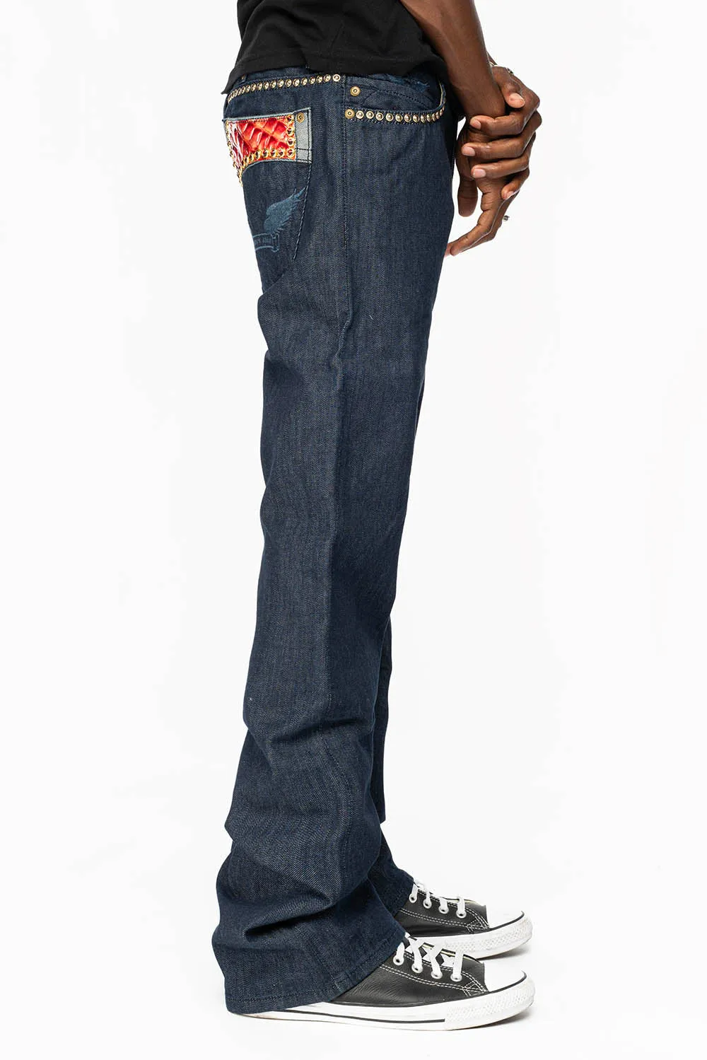BOOT CUT JEAN WITH PATENT LEATHER POCKET  EMBELLISHED WITH CRYSTALS AND STUDS IN RINSE WASH