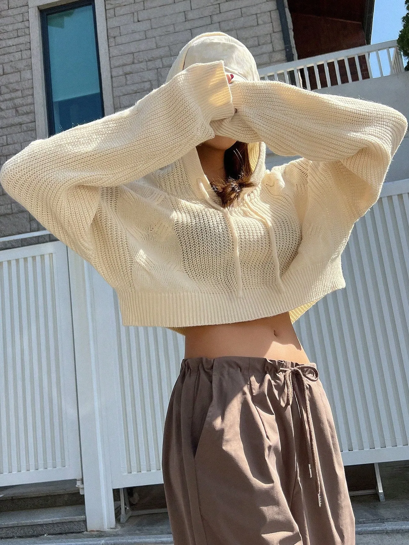DAZY Solid Drop Shoulder Drawstring Hooded Crop Sweater