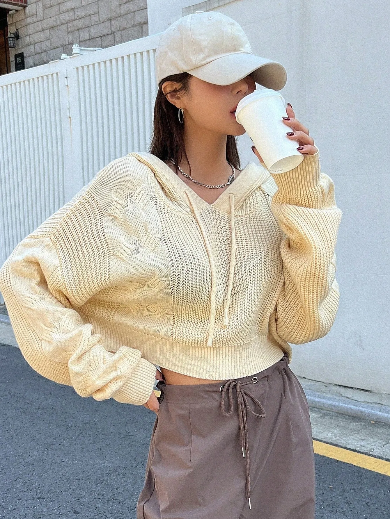 DAZY Solid Drop Shoulder Drawstring Hooded Crop Sweater