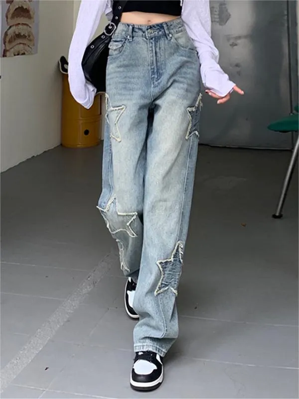 Faded vintage boyfriend jeans with star patch