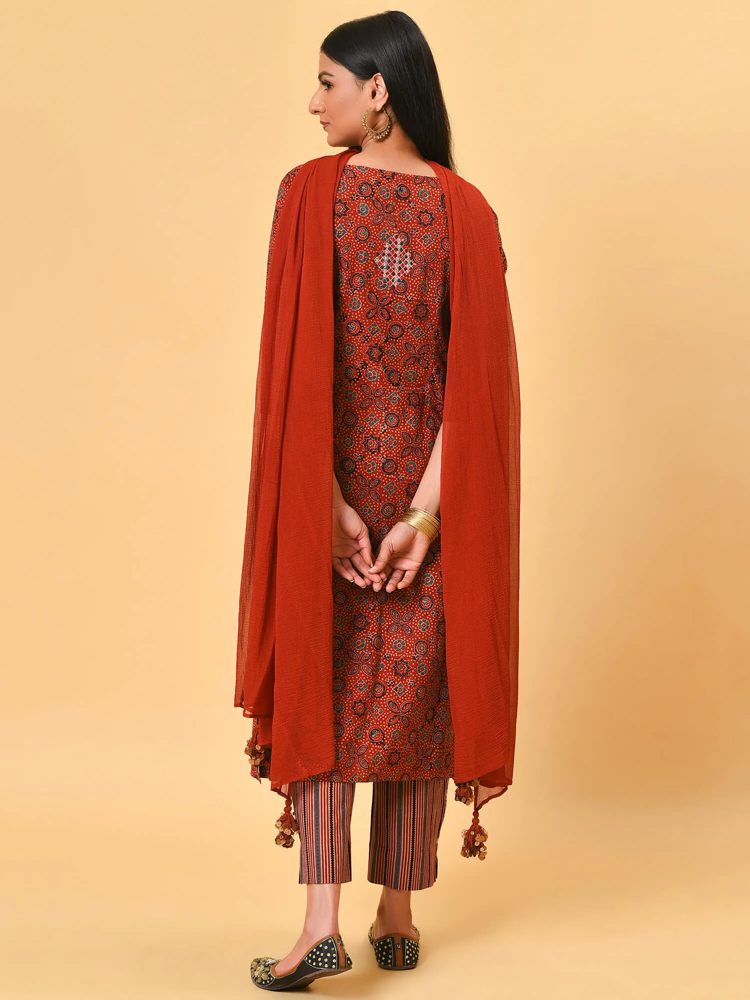 Indian apple cinnamon summer in a maroon ikat kurta pant and dupatta