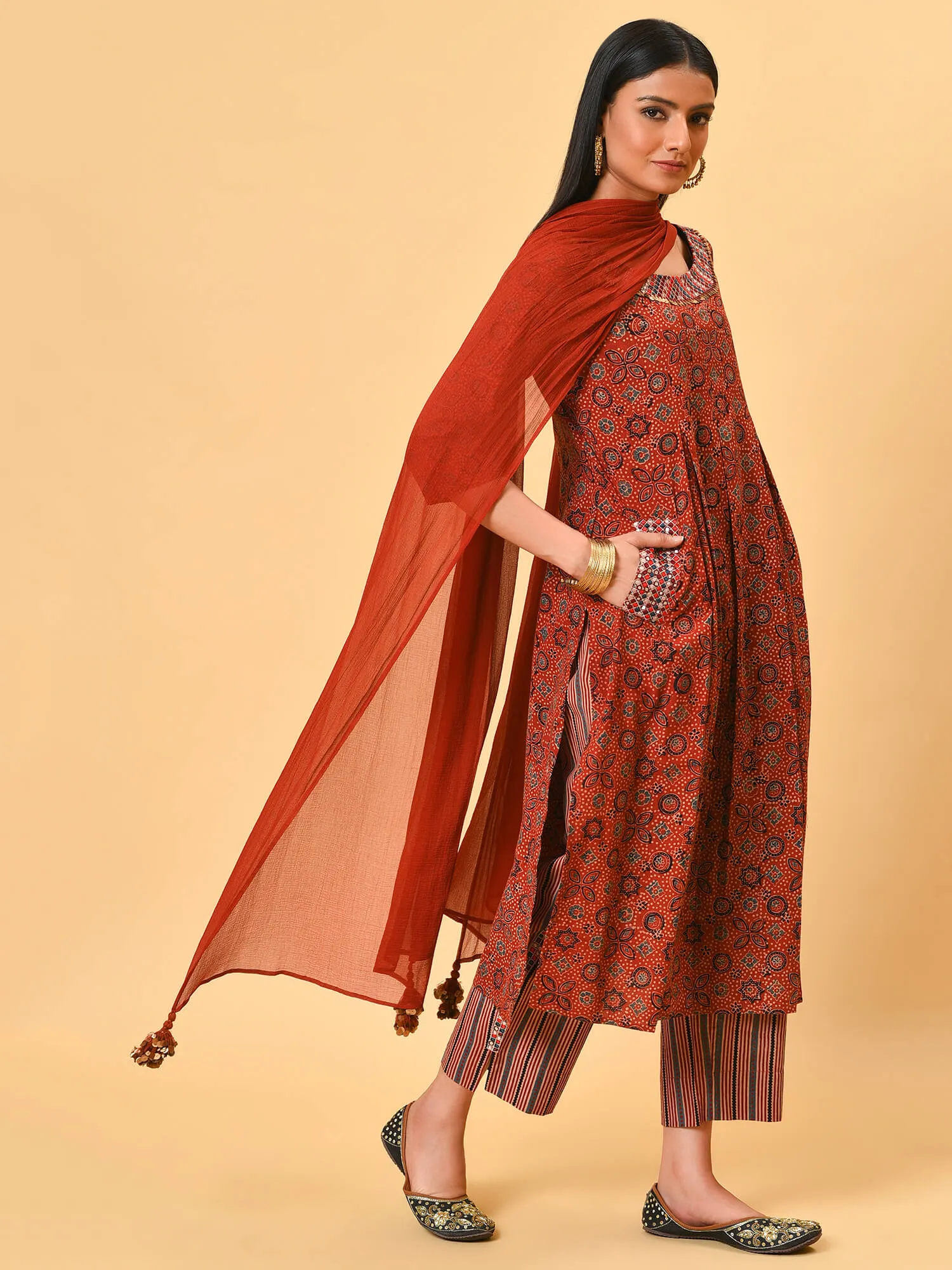 Indian apple cinnamon summer in a maroon ikat kurta pant and dupatta