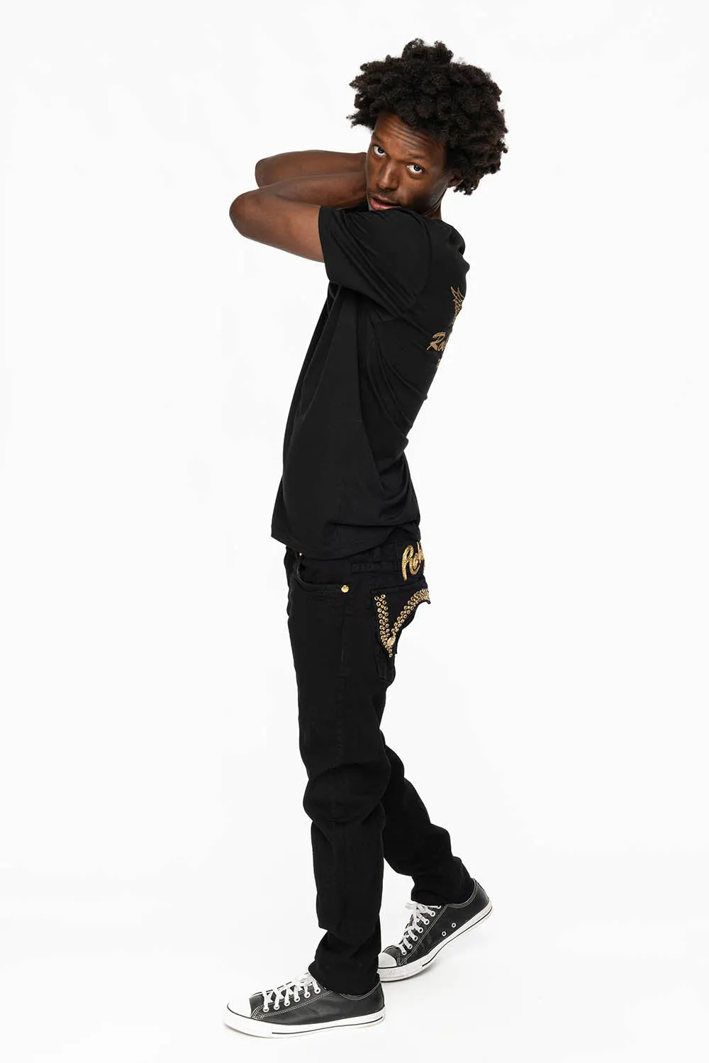 KILLER FLAP MENS SKINNY JEANS IN PURE BLACK WITH GOLD ROBIN’S LOGO AND GOLD AURUM CRYSTALS
